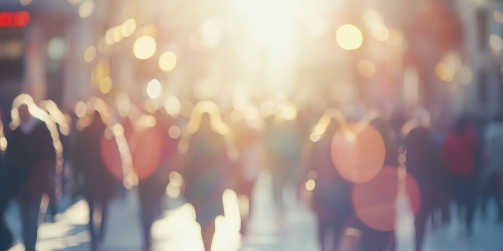 Blurred crowd of people walking in the city